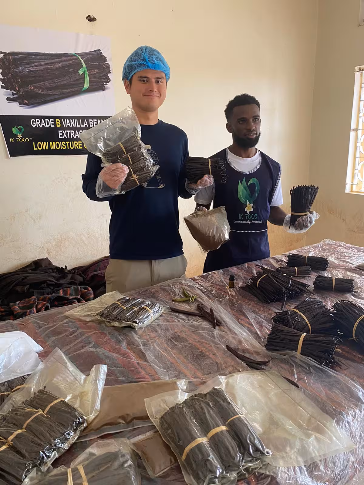 IK Food Uganda team with packaged vanilla ready for export